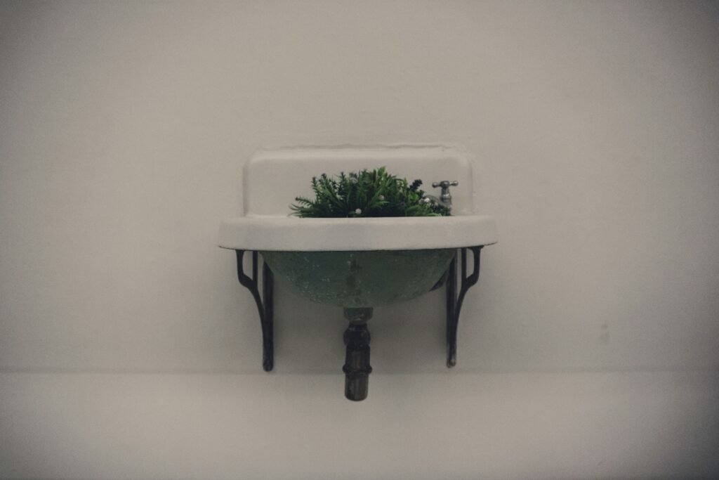 white ceramic bowl on black wooden table